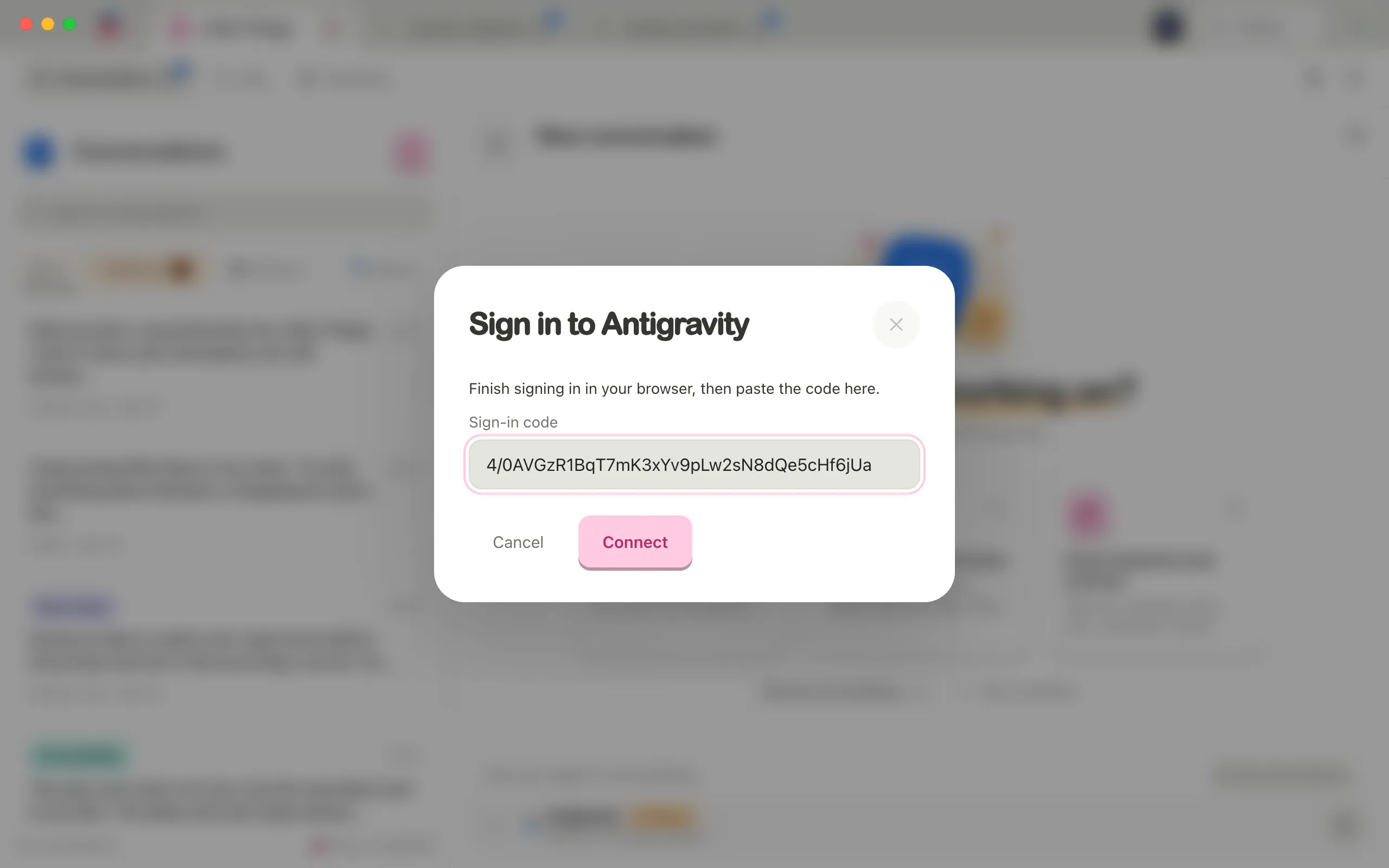 The Sign in to Antigravity window, with the code from the browser pasted into Sign-in code. Highlighted: Sign-in code.